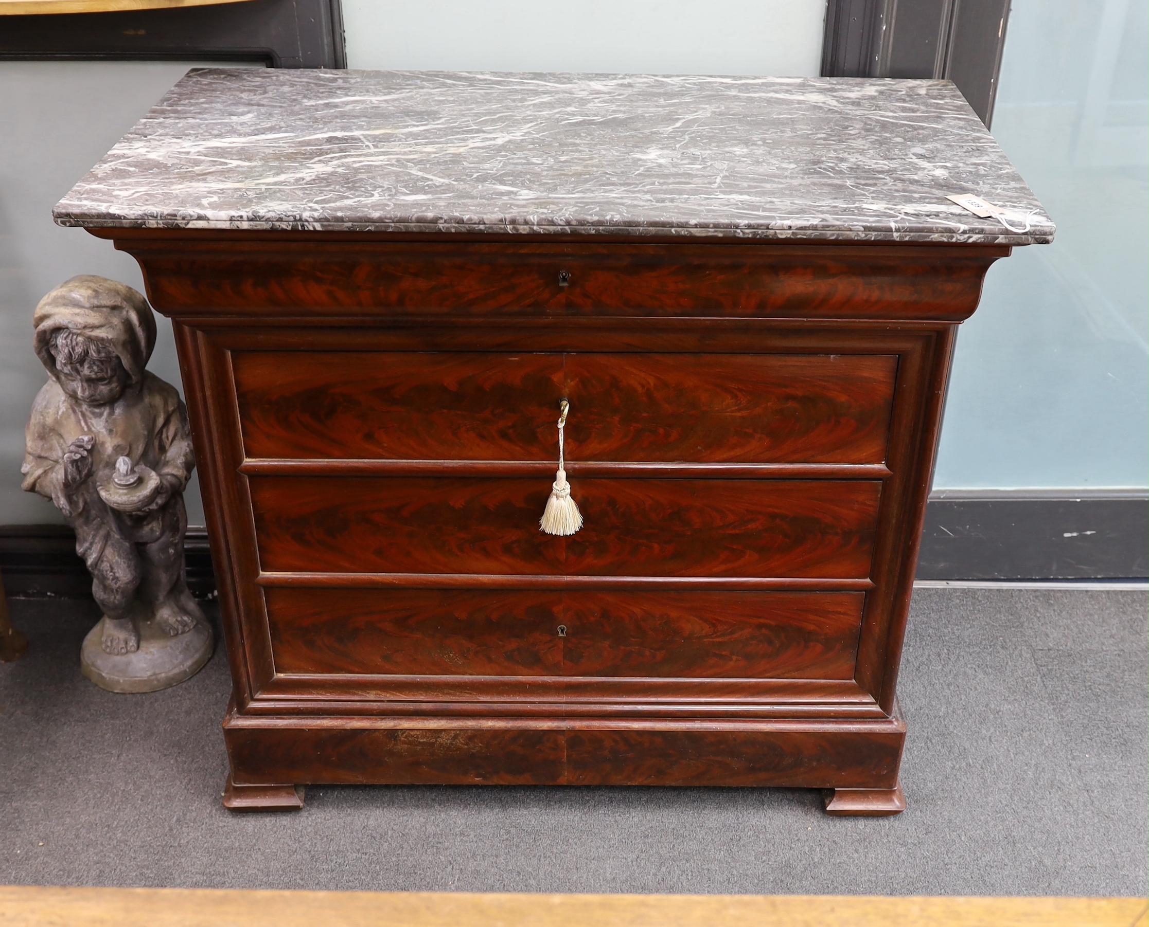 A 19th century French marble top mahogany commode, width 110cm, depth 57cm, height 96cm